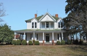 exwhite exterior with green roofing, save this old home Grimesland north carolina victorian farmhouse